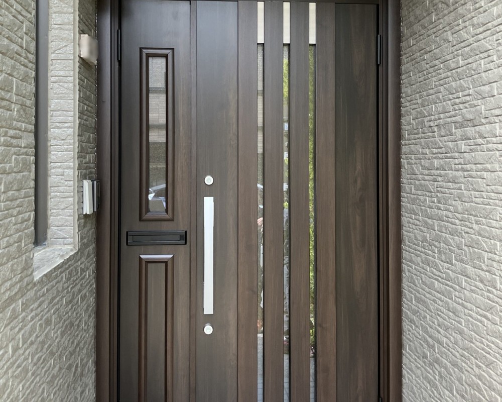 風除室ではなく断熱ドアで快適な玄関へ